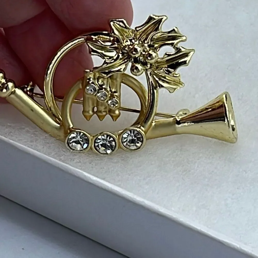 Vintage AGC matte and shiny embellished French Horn brooch.